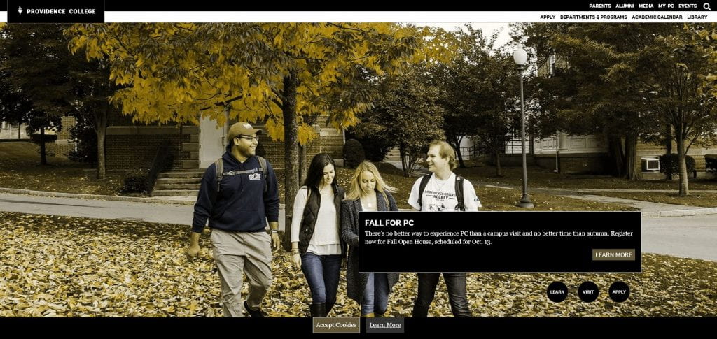 yellow-green tinted image of four students walking