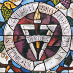 A stained glass mosaic of the Providence College seal