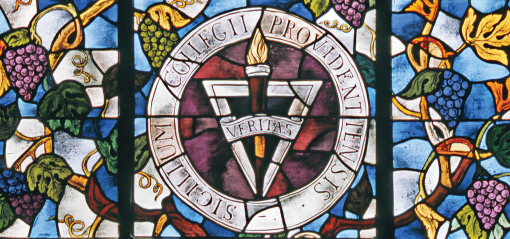 A stained glass mosaic of the Providence College seal